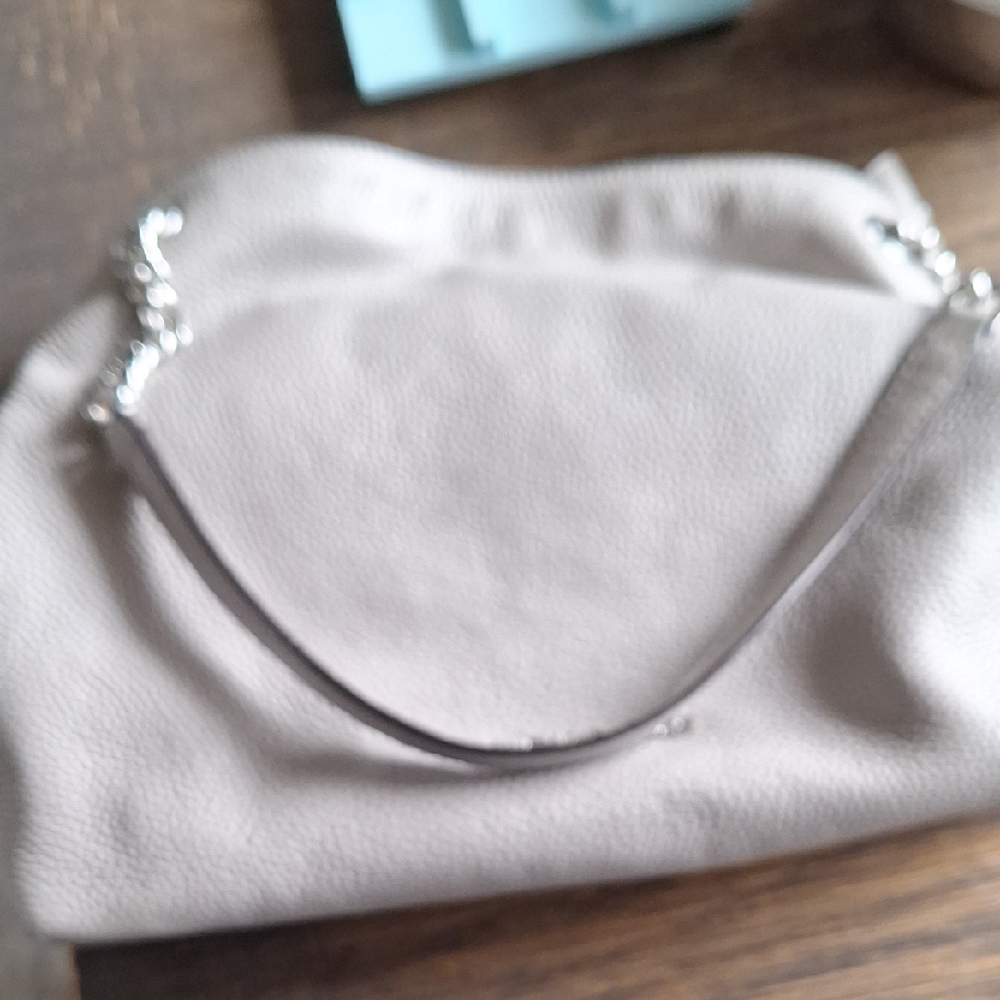Elegant Beige Handbag with Silver Chain